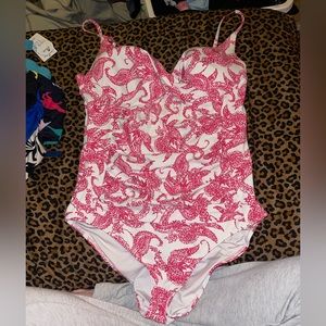 One piece pink and white bathing suit